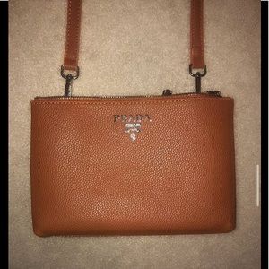 Tan-ish brown Prada side pouch/bag